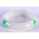 AN EARLY 20TH CENTURY CHINESE JADEITE BANGLE Late Qing/Republic. 7.5 cm diameter.