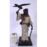 A LARGE CONTEMPORARY CONTINENTAL COLD PAINTED BRONZE HUNTER modelled holding a bird and rifle. 40 cm