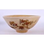 A 19TH CENTURY JAPANESE MEIJI PERIOD SATSUMA BOWL painted with flowers. 16 cm diameter.