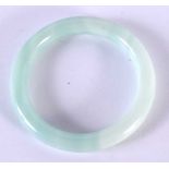 A CHINESE PEKING JADEITE GLASS 20th Century. 43.8 grams. 6 cm diameter.