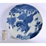 A VERY LARGE 18TH/19TH CENTURY JAPANESE EDO PERIOD BLUE AND WHITE CHARGER painted with a