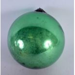 AN ANTIQUE GLASS WITCHES BALL. 13.5 cm wide.