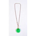 A 9CT GOLD JADEITE NECKLACE. 11.2 grams. Chain 45 cm long, pendant 3.5 cm x 3 cm.