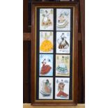A framed collection of vintage postcards depicting Spanish women wearing traditional dress woven
