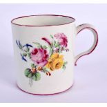 18th century Mennecy coffee can painted with flowers under a puce border. 6cm high