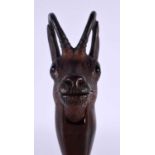 A PAIR OF ANTIQUE BAVARIAN BLACK FOREST CARVED WOOD NUT CRACKERS formed as a deer. 15 cm long.