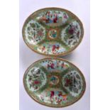 A PAIR OF 19TH CENTURY CHINESE CANTON FAMILLE ROSE DISHES painted with figures in landscapes. 27