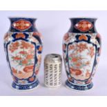 A PAIR OF 19TH CENTURY JAPANESE MEIJI PERIOD IMARI VASES painted with fans and landscapes. 24 cm x