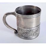 A SILVER MUG. 85 grams. 10.5 cm x 7.5 cm.