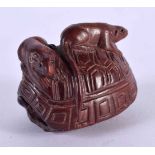 A JAPANESE CARVED BOXWOOD TORTOISE NETSUKE. 6 cm x 4 cm.