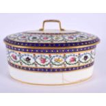 Sevres butter box and cover elaborately painted with flowers surrounded by chains of blue pearls and