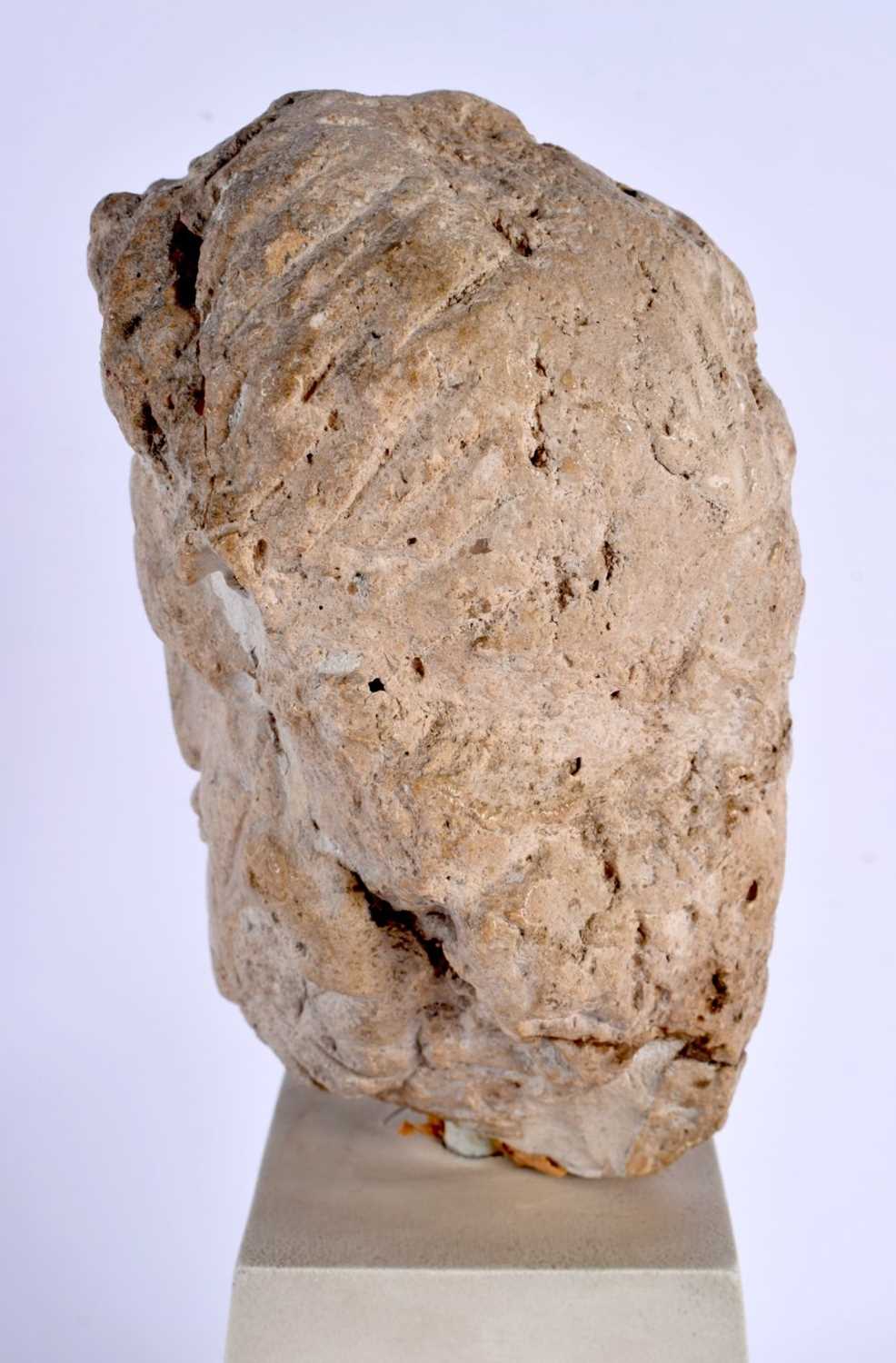 A RARE ROMANO BRITISH CARVED LIMESTONE HEAD C200AD depicting an elderly male, upon a white painted - Image 3 of 4