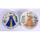 A SMALL PAIR OF TURKISH KUTAHYA POTTERY PLATES painted with a figure amongst foliage. 13.5 cm