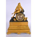 A 19TH CENTURY FRENCH GILT BRONZE MANTEL CLOCK formed with a male upon a stump. 34 cm x 22 cm.
