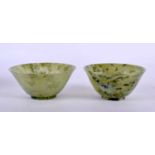 TWO EARLY 20TH CENTURY CHINESE CARVED JADEITE BOWLS Late Qing/Republic. Largest 9.5 cm diameter. (