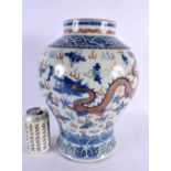 A LARGE 19TH CENTURY CHINESE FAMILLE VERTE BLUE AND WHITE BALUSTER VASE bearing Qianlong marks to