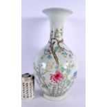 A LARGE CHINESE FAMILLE ROSE PORCELAIN VASE 20th Century, painted with flowers. 42 cm x 20 cm.