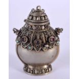 A 19TH CENTURY CHINESE TIBETAN SILVER SNUFF BOTTLE inset with gems. 44 grams. 6.5 cm x 4.5 cm.