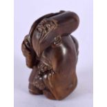 A JAPANESE CARVED BOXWOOD SAGE NETSUKE. 6 cm x 3 cm.