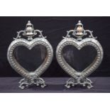 A pair of metal and glass heart shaped lanterns 53 cm (2).