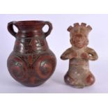 A SOUTH AMERICAN POTTERY FIGURE OF A SEATED GOD together with a similar twin handled vase. Largest
