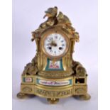 A LARGE 19TH CENTURY FRENCH BRONZE AND SEVRES PORCELAIN MANTEL CLOCK painted with putti. 34 cm x