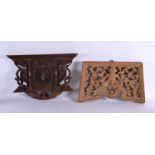 A 19TH CENTURY BURMESE JAVANESE CARVED WOOD TEMPLE PANEL together with a similar Nepalese carved