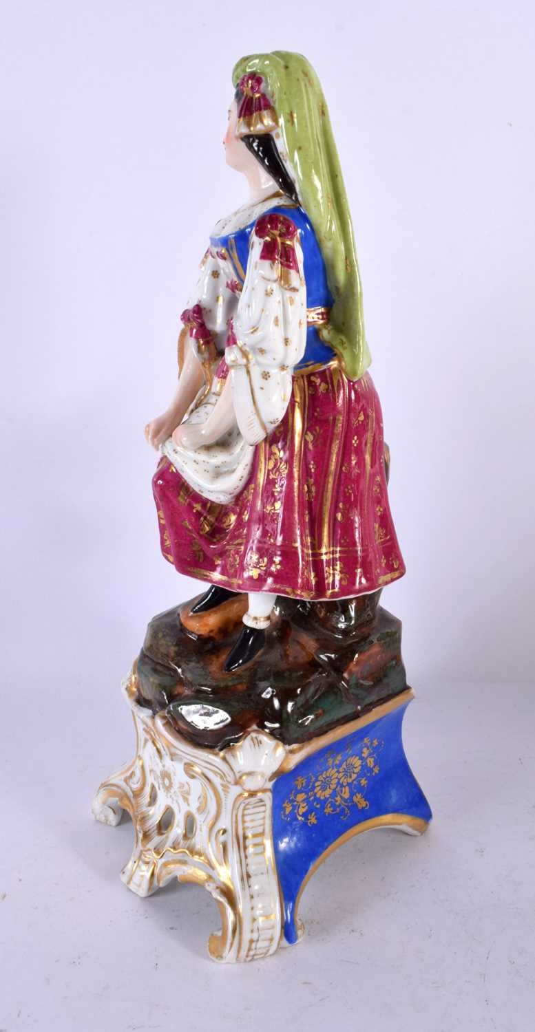 A LARGE 19TH CENTURY FRENCH PARIS PORCELAIN FIGURE OF A FEMALE modelled upon a naturalistic base. 32 - Image 2 of 4