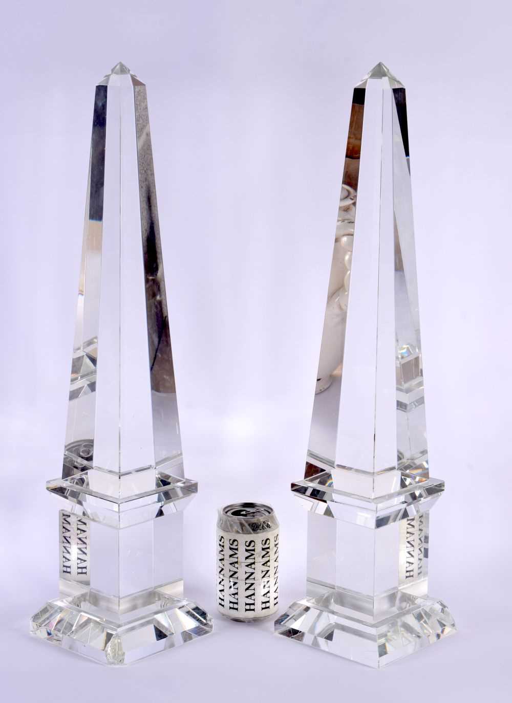 A LARGE PAIR OF 19TH CENTURY CONTINENTAL ROCK CRYSTAL OR GLASS OBELISKS of angular form. 56 cm