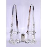 A LARGE PAIR OF 19TH CENTURY CONTINENTAL ROCK CRYSTAL OR GLASS OBELISKS of angular form. 56 cm