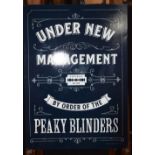 A contemporary metal advertising sign - 'Peaky Blinders'. 70 x 50cm.