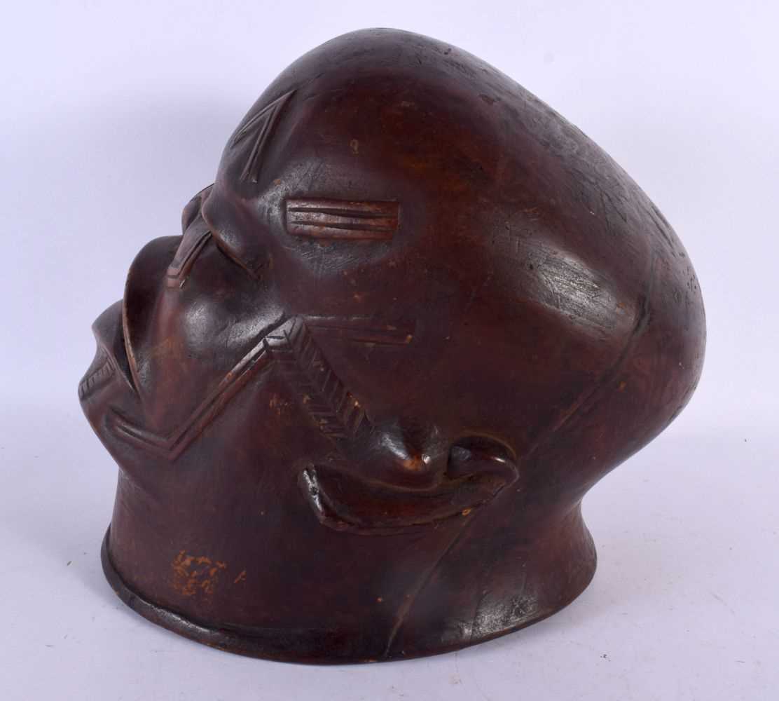 A GOOD EARLY 20TH CENTURY AFRICAN TRIBAL MAKONDE LIPIKO WOOD MASK used by an elder to celebrate - Image 2 of 4