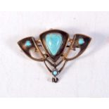 AN ANTIQUE YELLOW METAL AND TURQUOISE BROOCH. 6.2 grams. 2.5 cm x 3.5 cm.