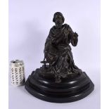 A LARGE 19TH CENTURY EUROPEAN SPELTER FIGURE OF A SCHOLAR modelled holding a serpent. 35 cm x 28