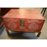 AN EARLY 20TH CENTURY CHINESE RED LACQUER DOCUMENT BOX upon a hardwood base. 65 cm x 40 cm.
