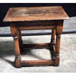 A small early oak joint stool 47 x 46 x 28 cm.