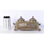 An Islamic brass ink stand embossed with calligraphy and floral pattern 13 x 23 x 15 cm.