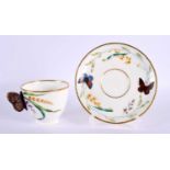 19th century English porcelain cup with butterfly handle and saucer, probably Minton, indistinct