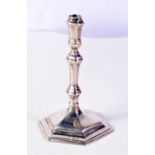 AN ANTIQUE SILVER TAPERSTICK. 108 grams. 11.5 cm high.