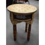 A LOVELY ANTIQUE MIDDLE EASTERN MOORISH LIBERTY TYPE TABLE decorated all over with mother of