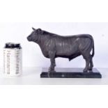 A bronze bull set on a plinth 17 x 24 cm.