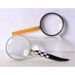 A Bakelite handled Magnifying glass together with another Magnifying glass 26 cm (2).