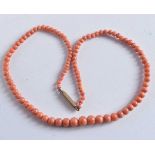 AN ART CORAL NECKLACE. 16 grams. 43 cm long.