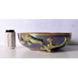A large Cetem ware bowl with gilt decoration to the interior to the rim 10x36cm.