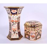 Royal Crown Derby box and cover and a Royal Crown Derby hexagonal vase. Box 9cm high, vase 16.5 cm