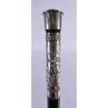 A RARE ANTIQUE CONTINENTAL SILVER NOVELTY WHISKEY DECANTING WALKING CANE decorated with foliage.