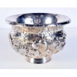 A 19TH CENTURY JAPANESE MEIJI PERIOD SILVER DRAGON BOWL decorated in relief with motifs. 246