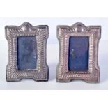 A PAIR OF SILVER PHOTOGRAPH FRAMES. London 1987. 218 grams. 13.25 cm x 9.5 cm.