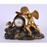 AN EARLY 19TH CENTURY FRENCH EMPIRE GILT BRONZE CLOCK of small proportions. 15 cm x 12 cm.