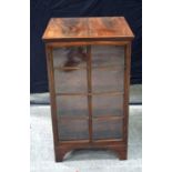 A mahogany four sided glass fronted book case 91 x 54 x 54 cm.